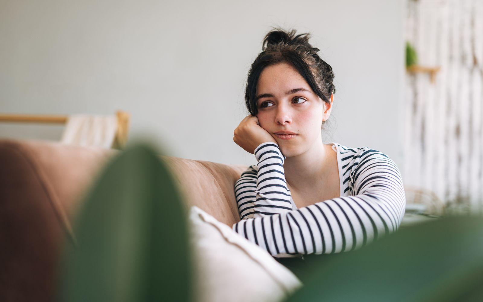 Depressionen: Frau mit nachdenklichem Gesichtsausdruck