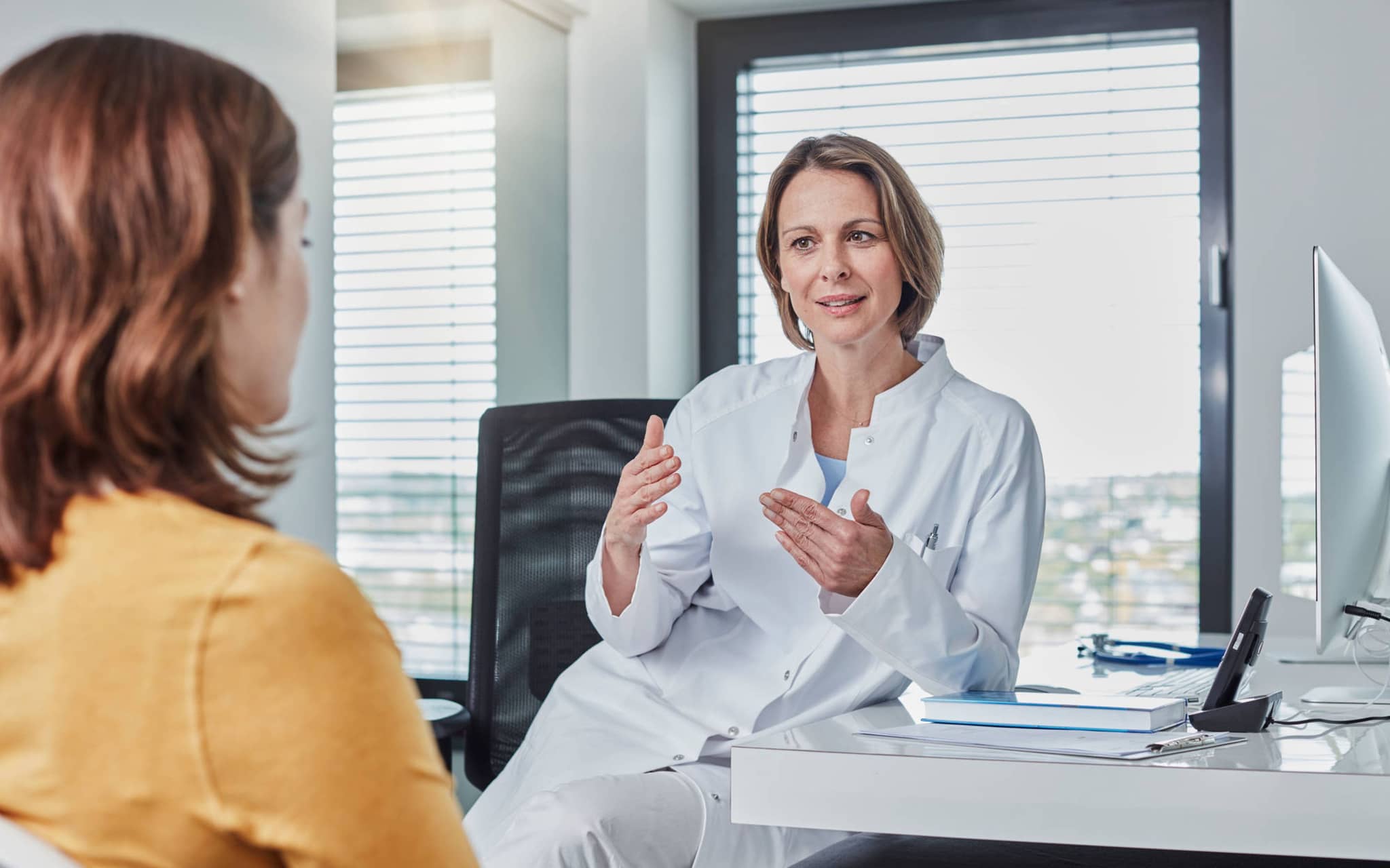 Patient talking to a doctor