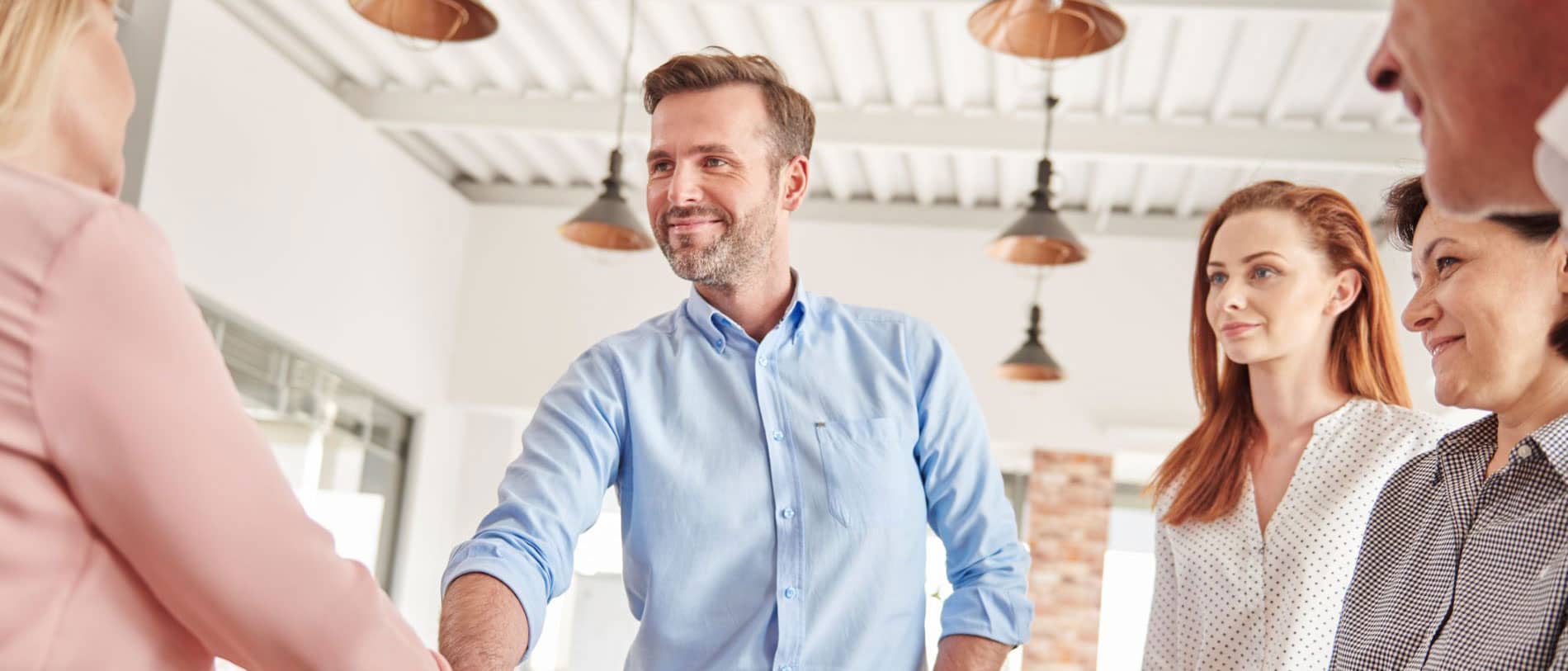 Image: The team welcomes a new colleague to the office