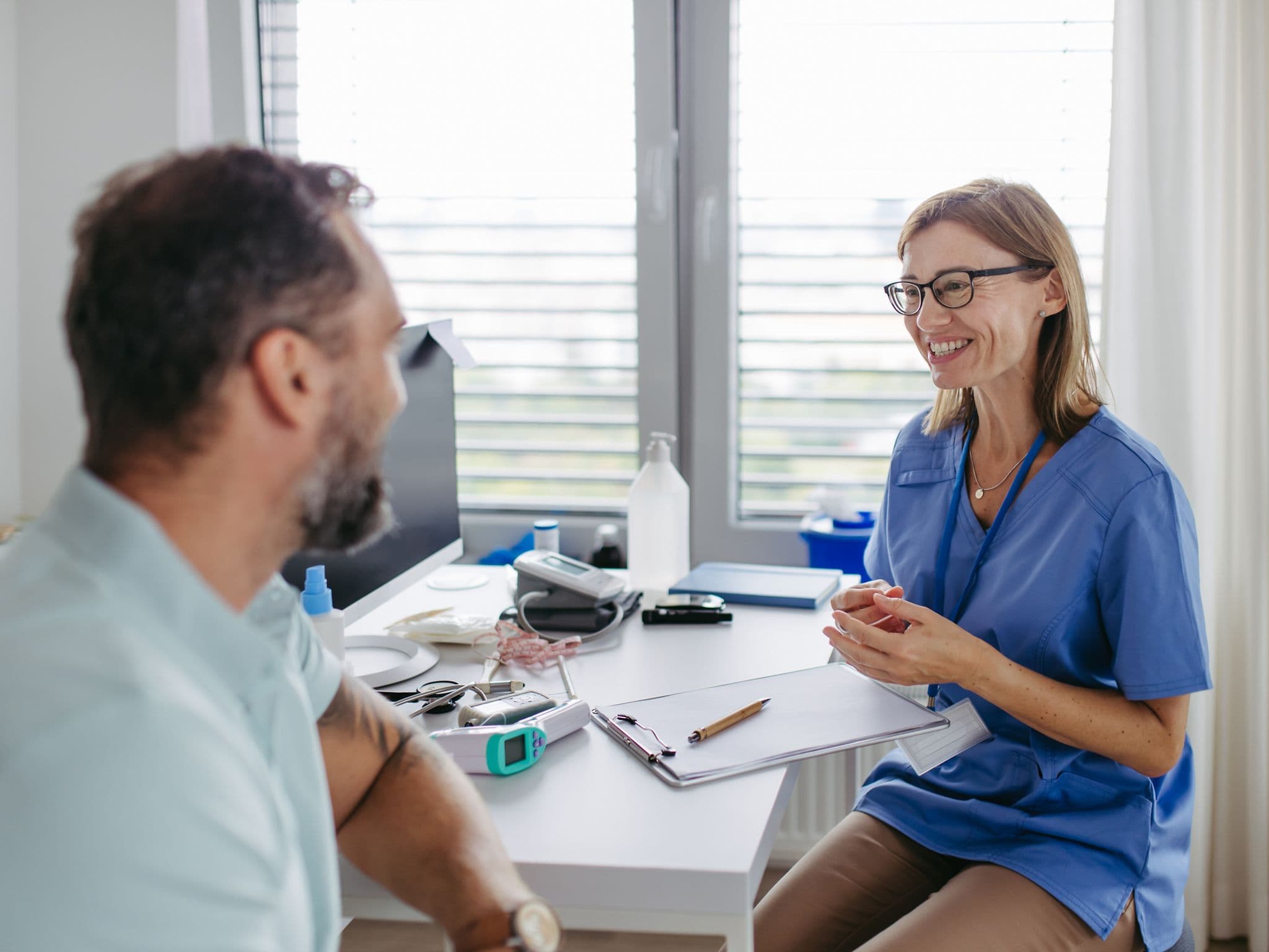 Patient and doctor in conversation.